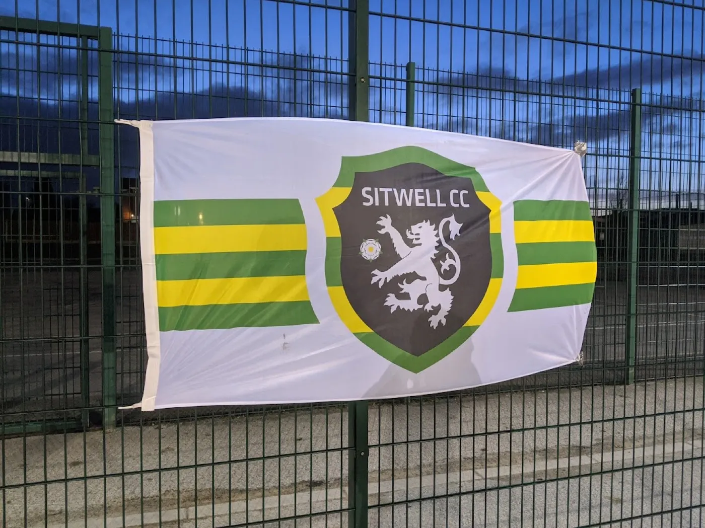 Sitwell CC crest flag on a fence